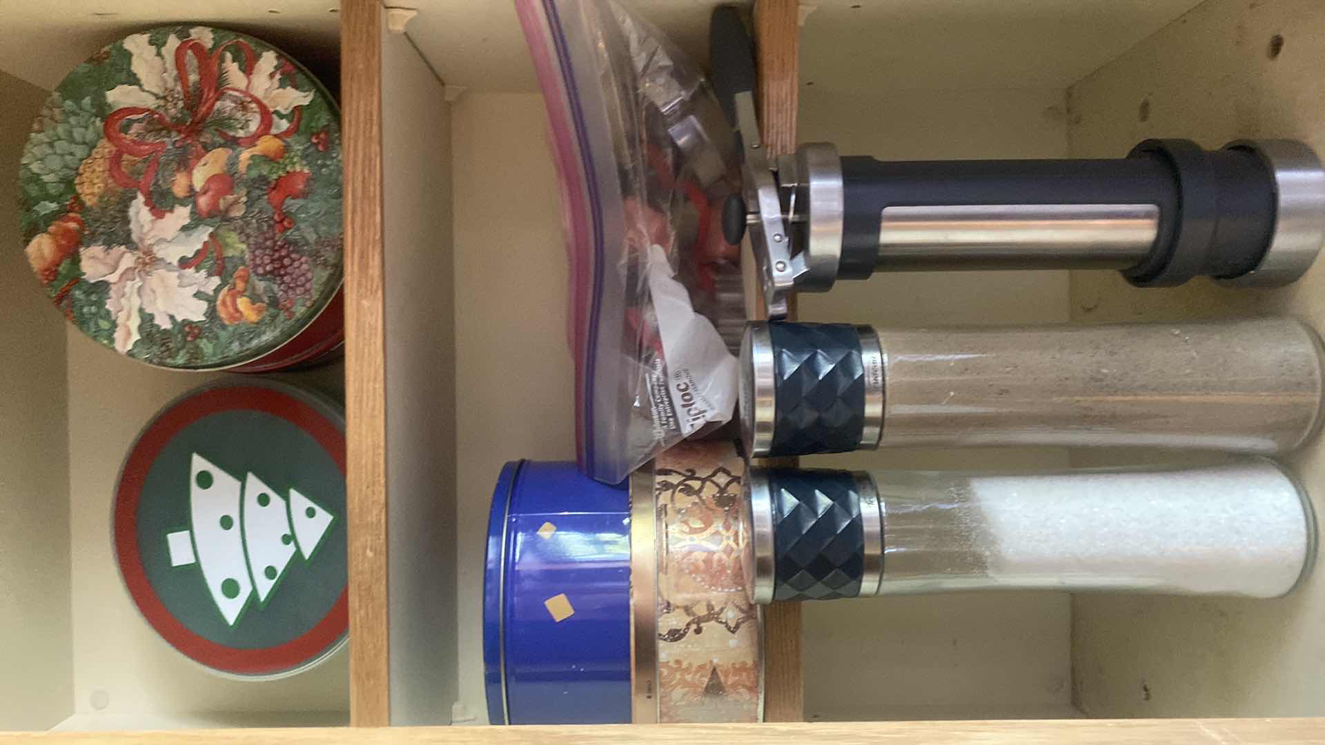 Photo 1 of CONTENTS KITCHEN CABINET - SALT & PEPPER GRINDERS, TINS & COOKIE CUTTERS