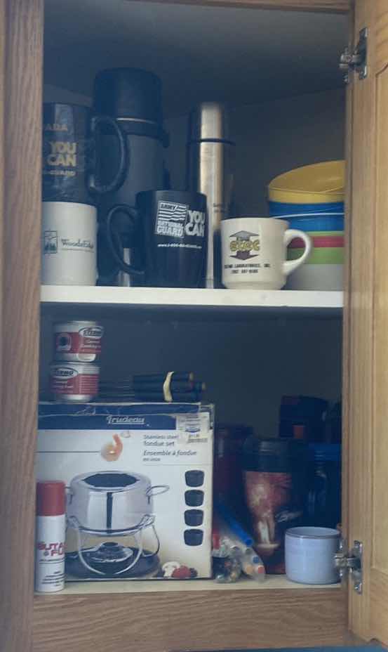 Photo 1 of CONTENTS OF KITCHEN CABINET - FONDUE, COFFEE CUPS & WATER BOTTLES