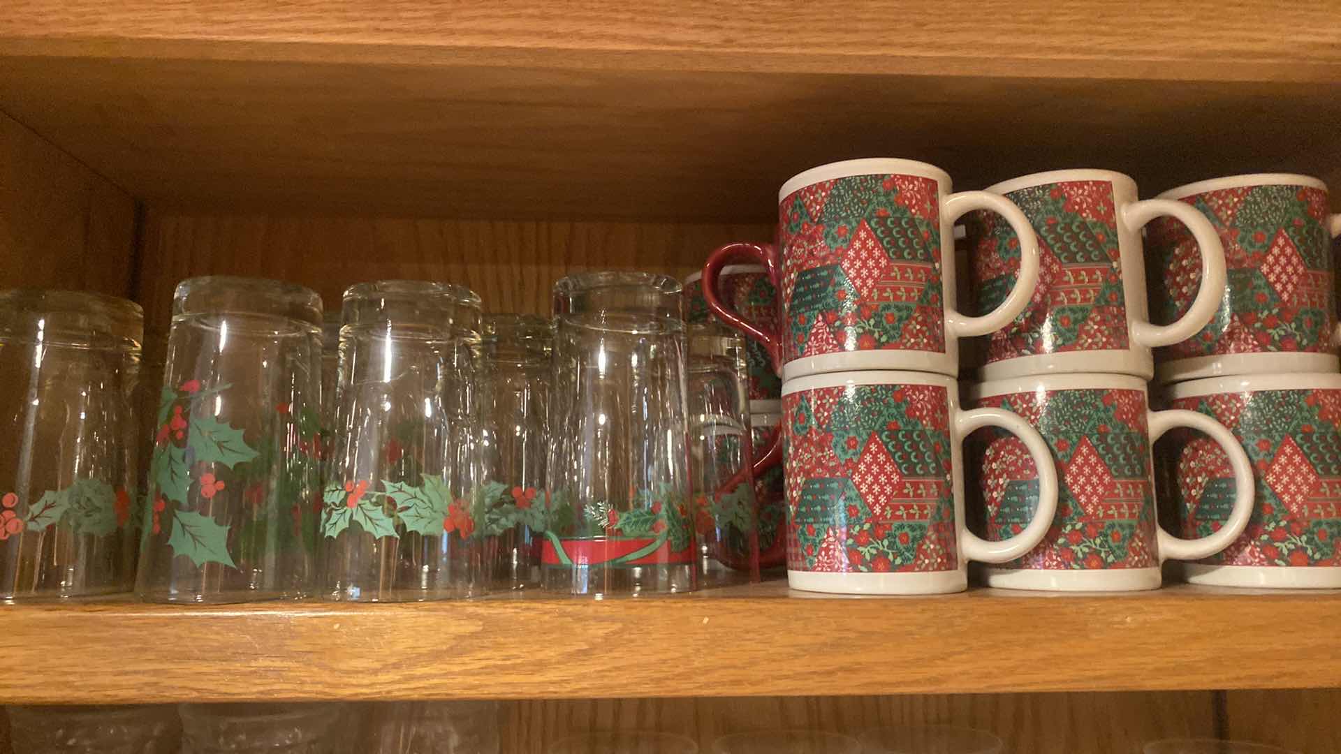 Photo 2 of CONTENTS OF KITCHEN CABINET - HOLIDAY MUGS & GLASSES, GLASSWARE