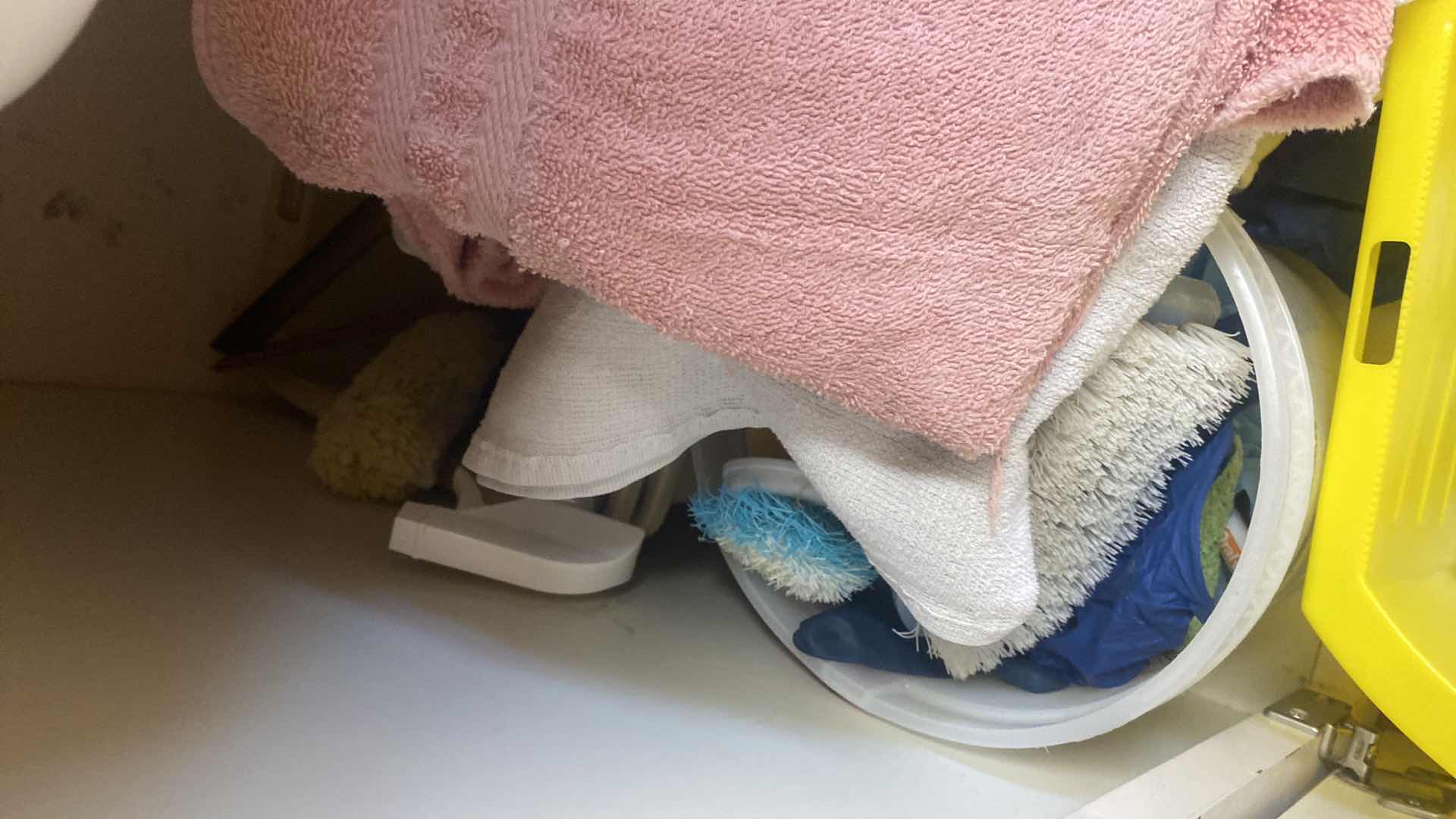 Photo 3 of CONTENTS OF LAUNDRY ROOM CABINET - UNDER SINK CLEANING SUPPLIES AND TOWELS