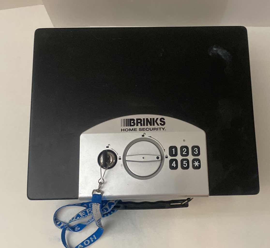 Photo 1 of BRINKS HOME SECURITY BOX WITH KEY (combination not known)