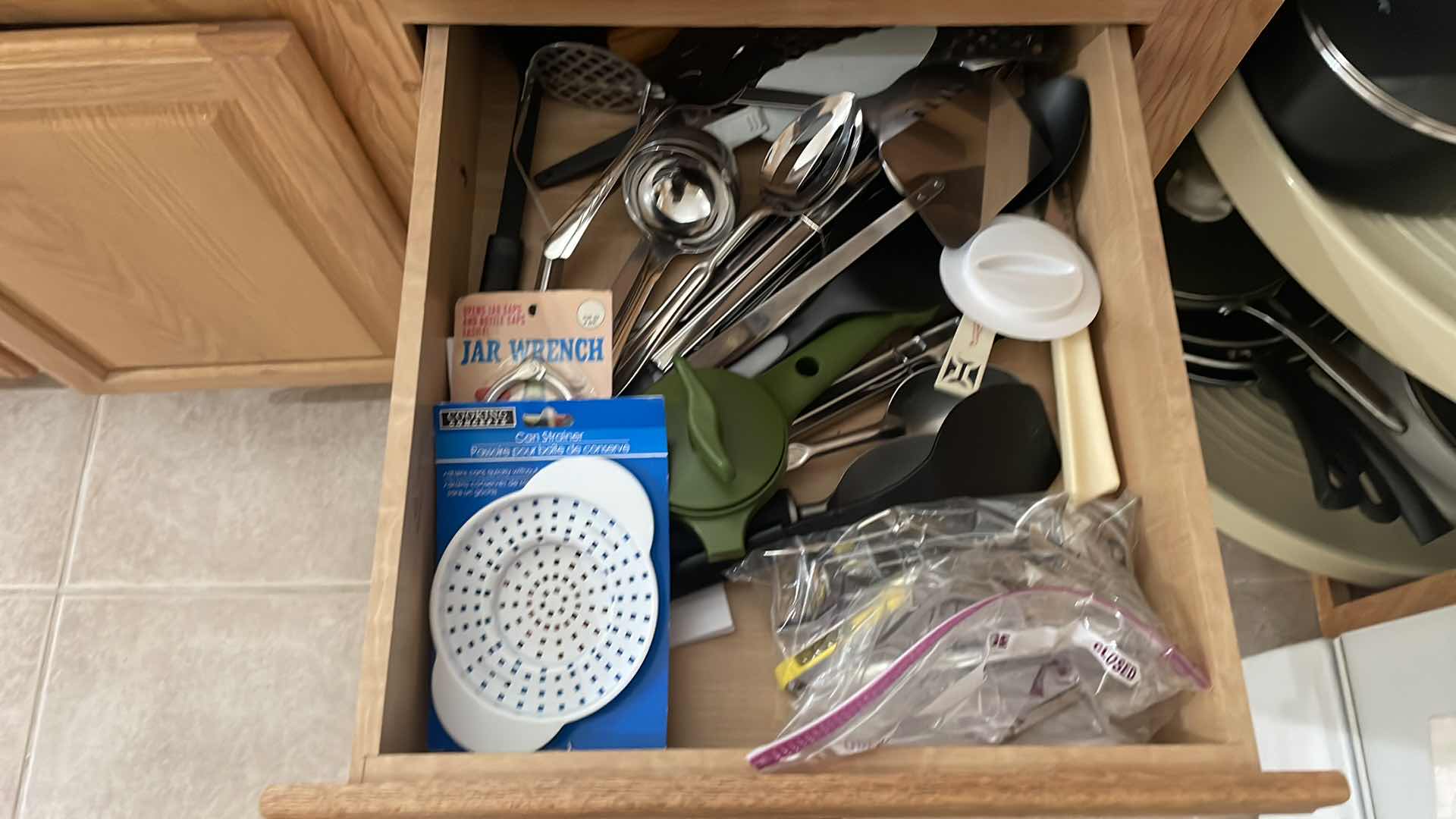 Photo 1 of CONTENTS OF UTENSIL CABINET