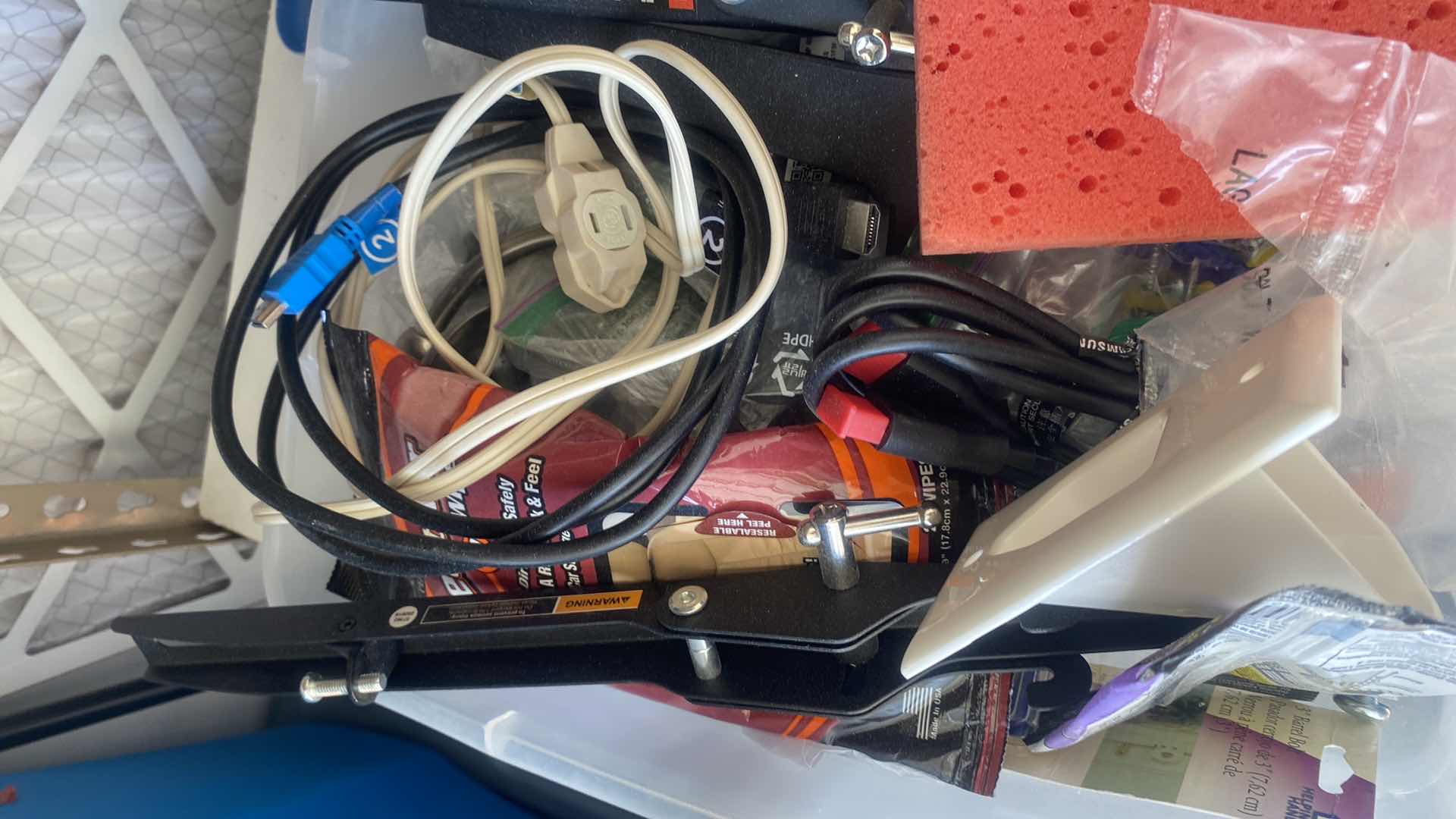 Photo 2 of SHELF IN GARAGE - ELECTRICAL FASTENERS STAPLER & MORE