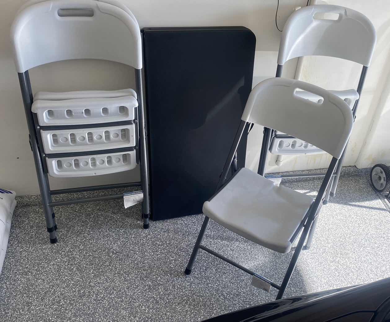 Photo 1 of FOLDED CARD TABLE & 4 PLASTIC CHAIRS