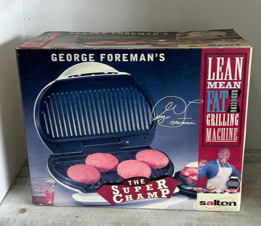 Photo 1 of GEORGE FOREMAN LEAN, MEAN, FAT-REDUCING GRILLING MACHINE.