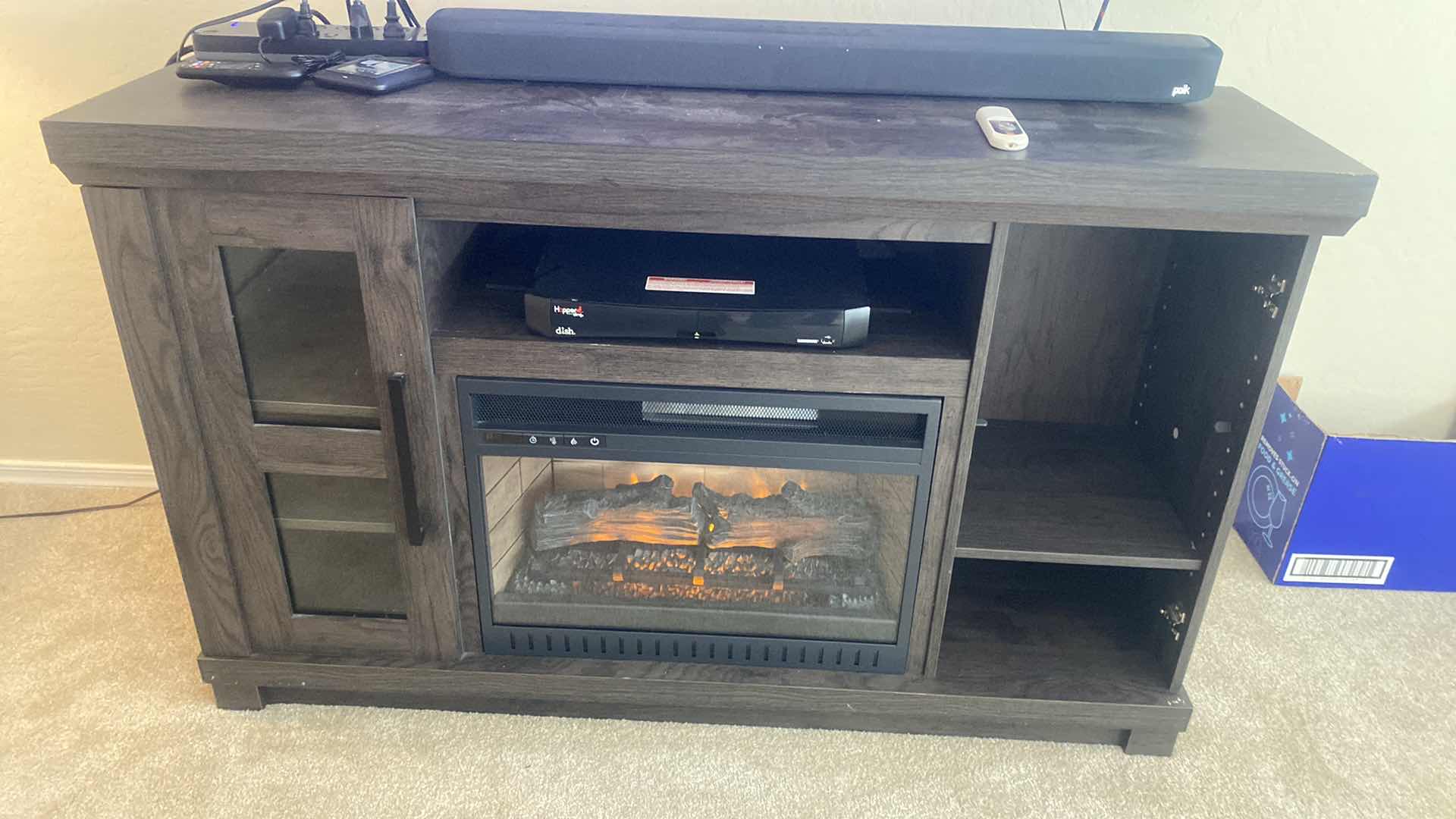 Photo 1 of VENEER WOOD ENTERTAINMENT CENTER WITH ELECTRIC FIREPLACE & REMOTE (needs batteries) 54” x 15 1/2” H 33”