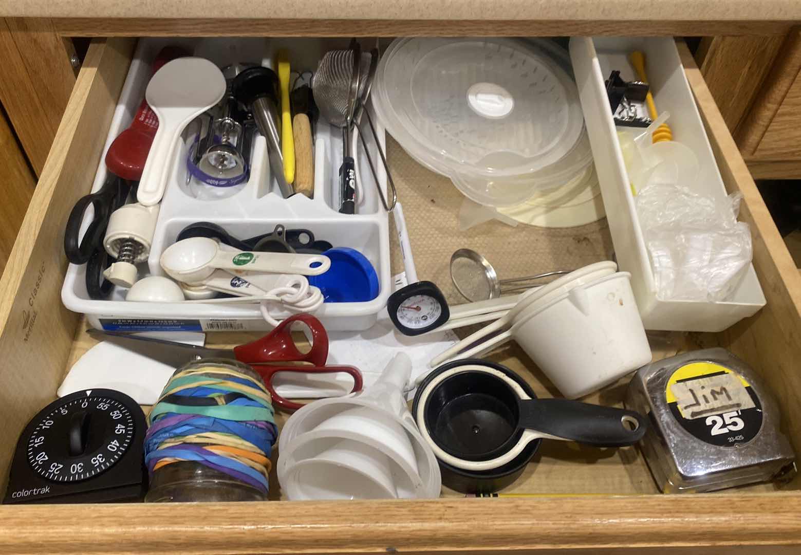 Photo 1 of CONTENTS OF KITCHEN CABINET -  TIMERS & KITCHEN TOOLS