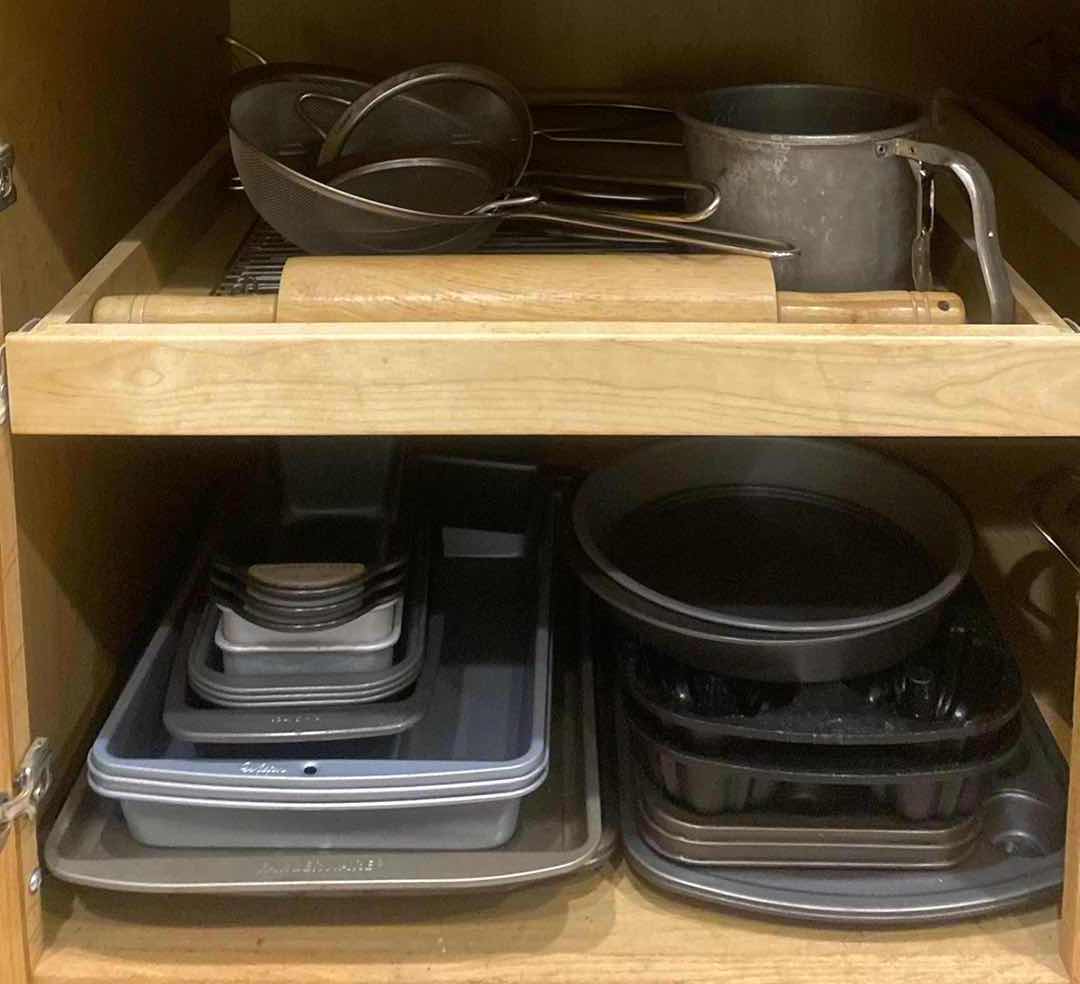 Photo 1 of CONTENTS OF KITCHEN CABINET -  BAKEWARE