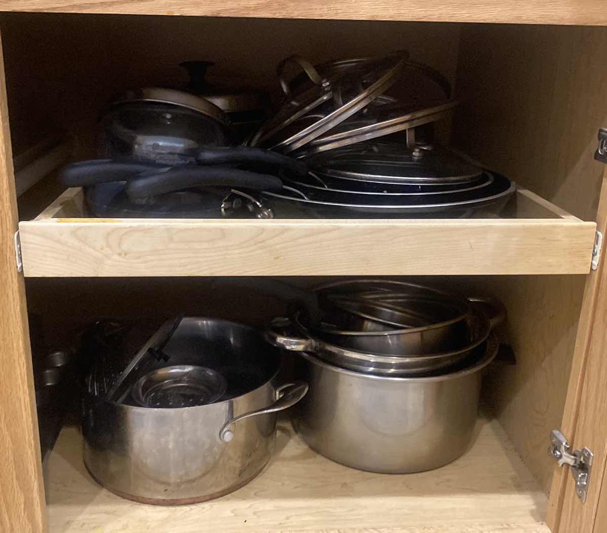 Photo 1 of CONTENTS OF KITCHEN CABINET -  POTS & PANS