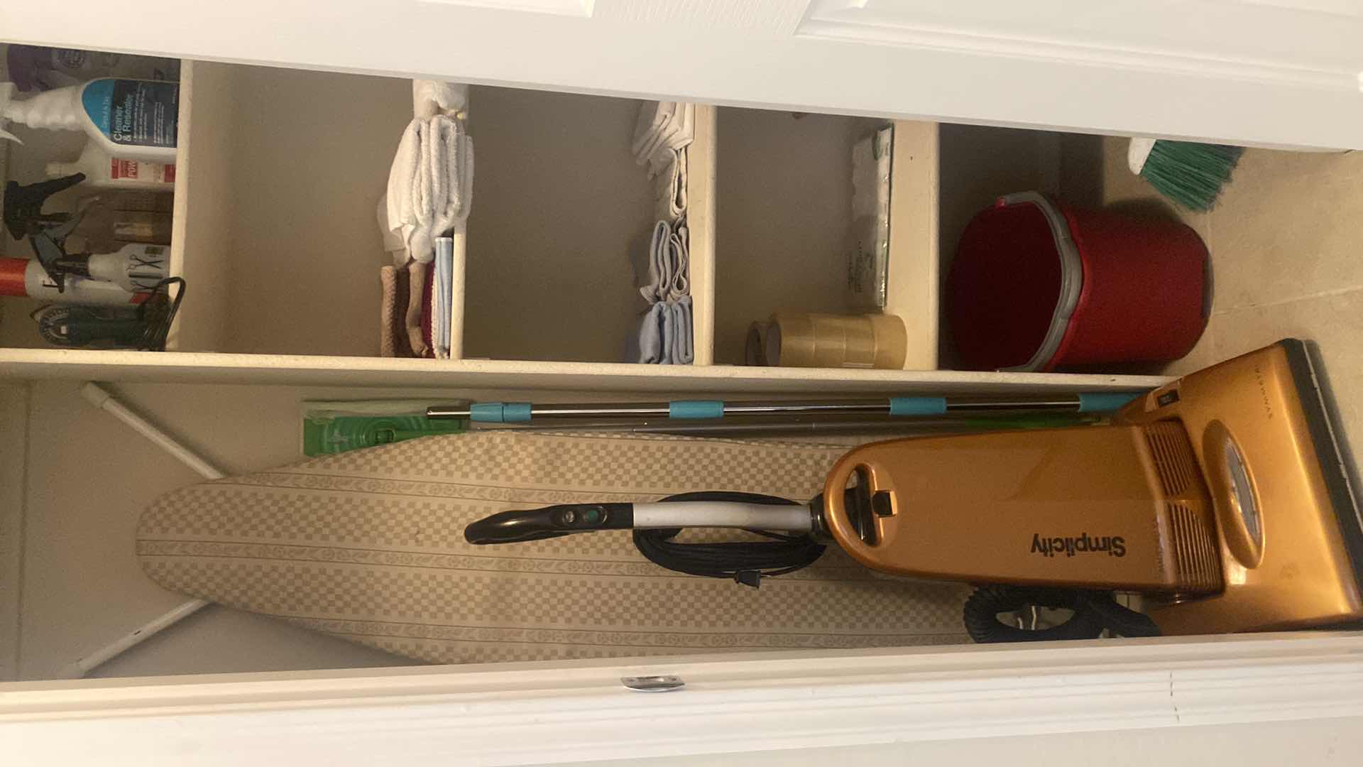 Photo 1 of HALL CLOSET- SIMPLICITY VACUUM IRONING BOARD CLEANING TOOLS & SUPPLIES