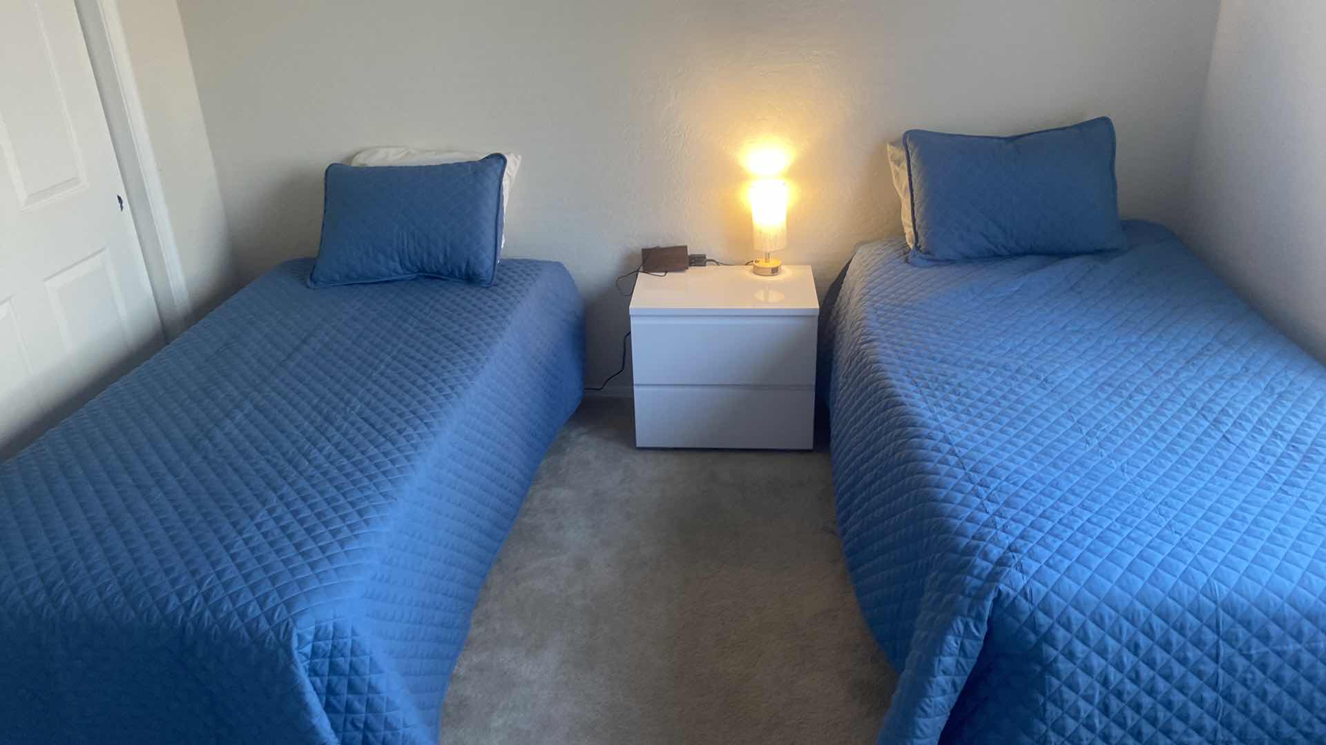 Photo 1 of 2-TWIN SIZE BLUE COVERLETS WITH SHAMS & BED PILLOWS & MATTRESS PADS INCLUDING 1 FOAM PAD