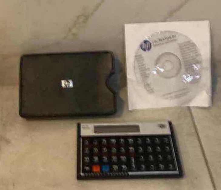 Photo 1 of HP 12C FINANCIAL CALCULATOR WITH CASE & CD