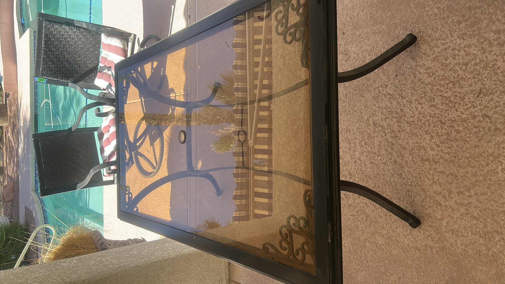Photo 1 of TINTED GLASS TOPPED OUTDOOR METAL PATIO TABLE 68“ X 40“ X  H29 1/2 “