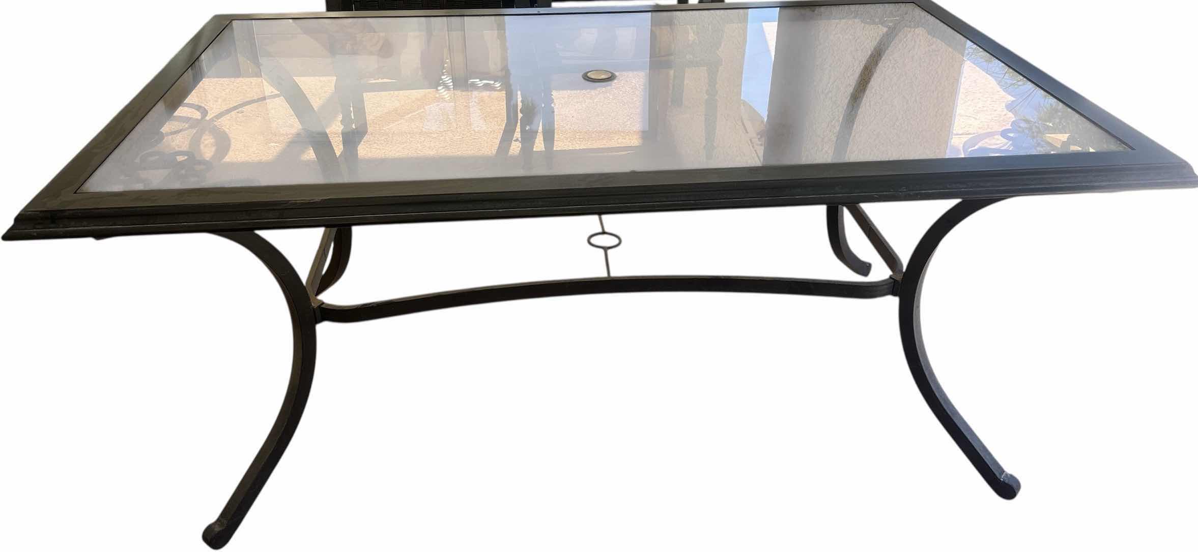 Photo 1 of TINTED GLASS TOPPED OUTDOOR METAL PATIO TABLE 68“ X 40“ X H29 1/2 “