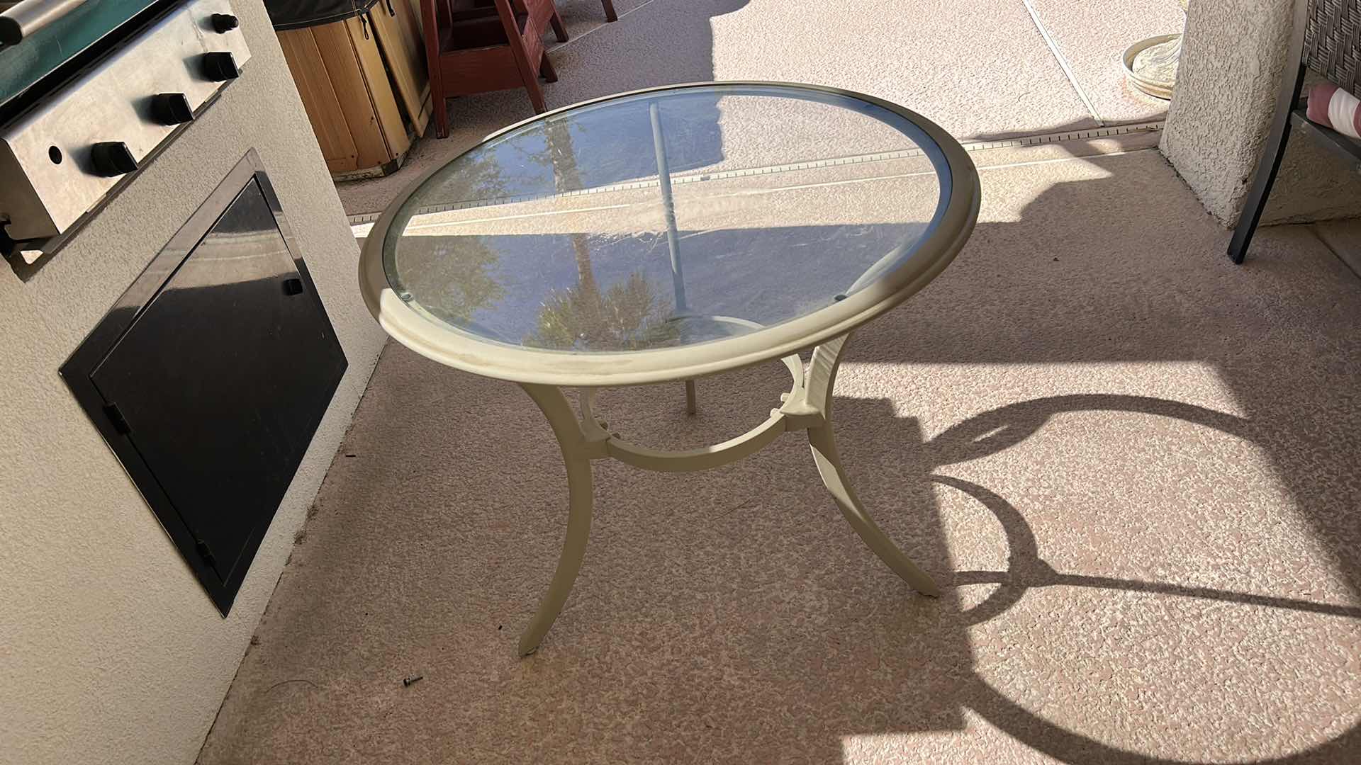 Photo 1 of OUTDOOR METAL GLASS TOP TABLE 31 1/2“ x H28“
