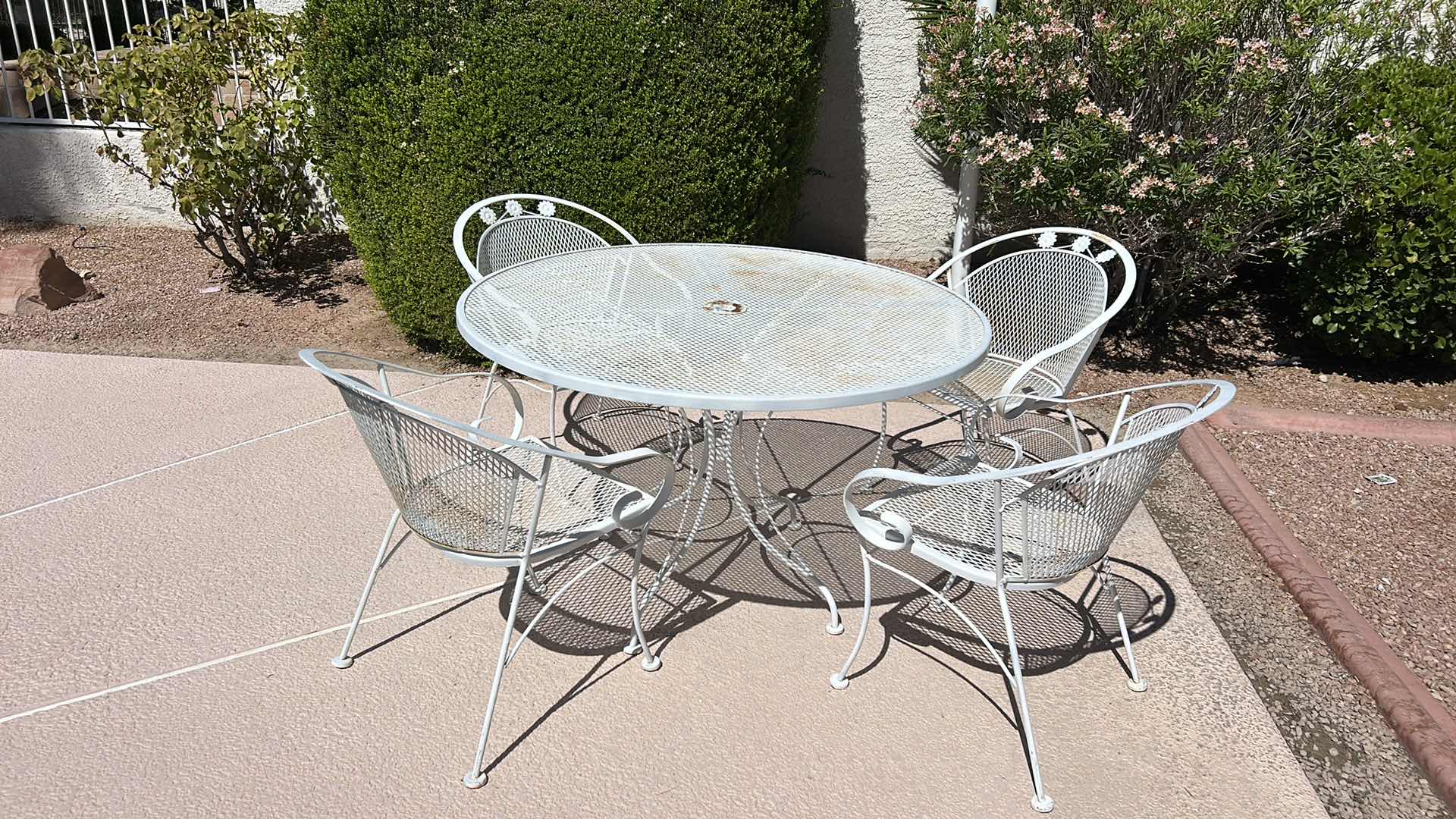 Photo 1 of VINTAGE METAL OUTDOOR PATIO TABLE  4‘ x H29 1/2“AND 4 CHAIRS