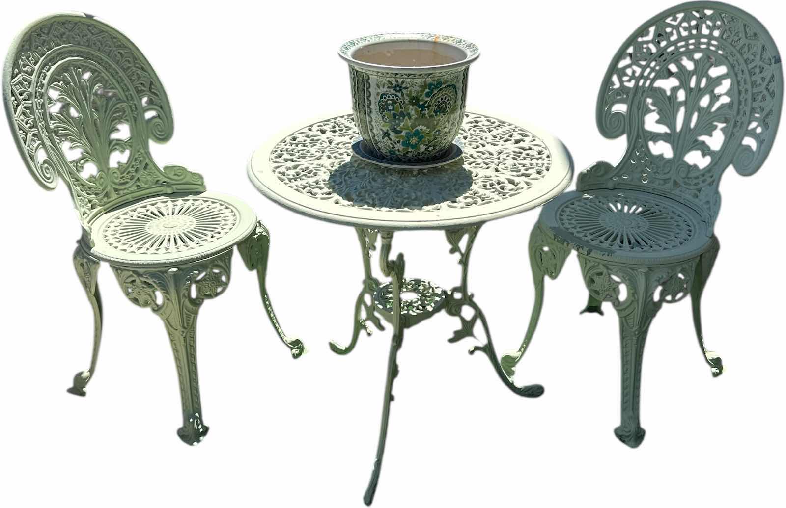 Photo 1 of METAL PATIO BISTRO TABLE AND CHAIRS WITH CERAMIC PLANTER
TABLE
D26” X H26”