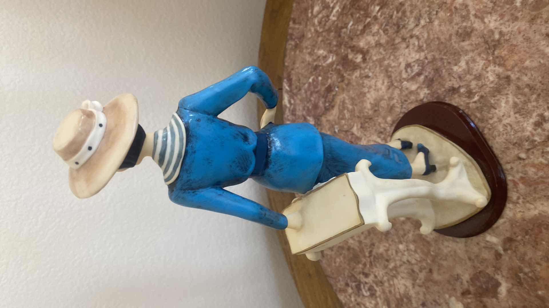 Photo 1 of CERAMIC FIGURINES WITH DOG & RESIN FIGURINE H14”