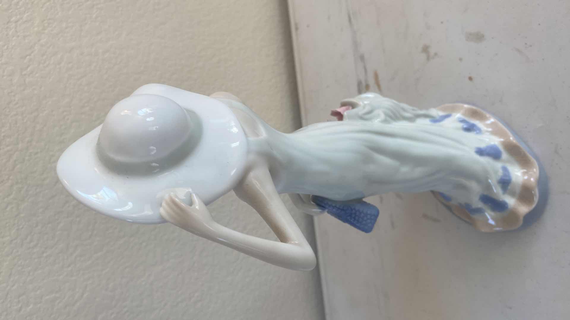 Photo 1 of PAIR OF CERAMIC FIGURINES H14”