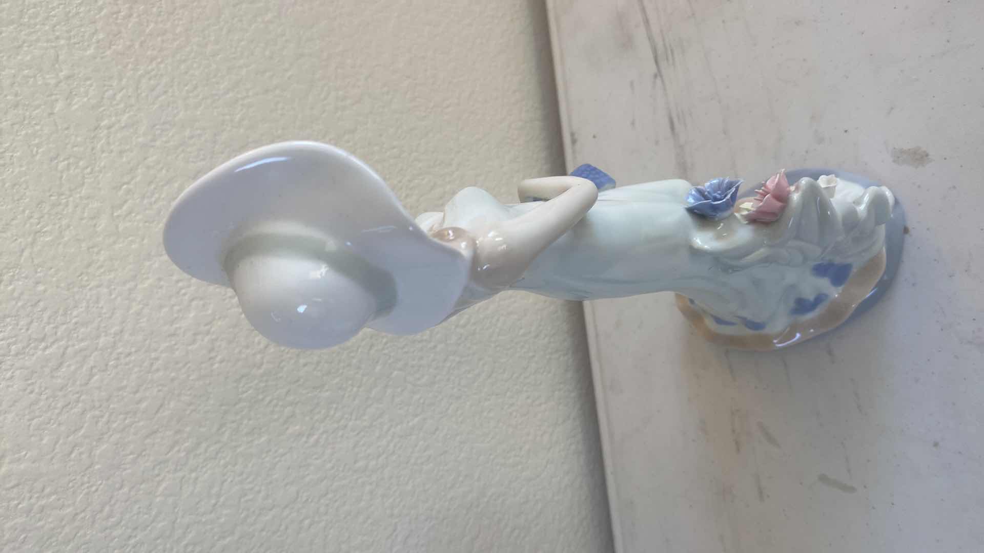Photo 1 of PAIR OF CERAMIC FIGURINES H14”