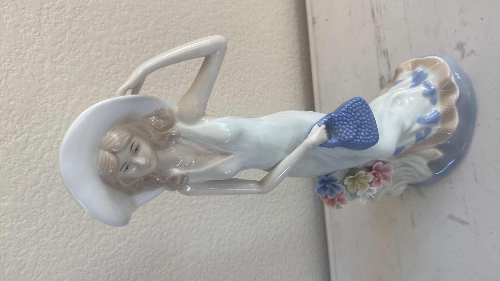 Photo 1 of PAIR OF CERAMIC FIGURINES H14”