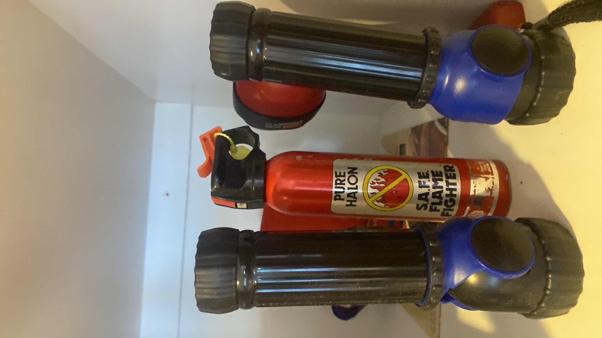 Photo 1 of CONTENTS KITCHEN CABINET -  COOKBOOKS & FLASHLIGHTS