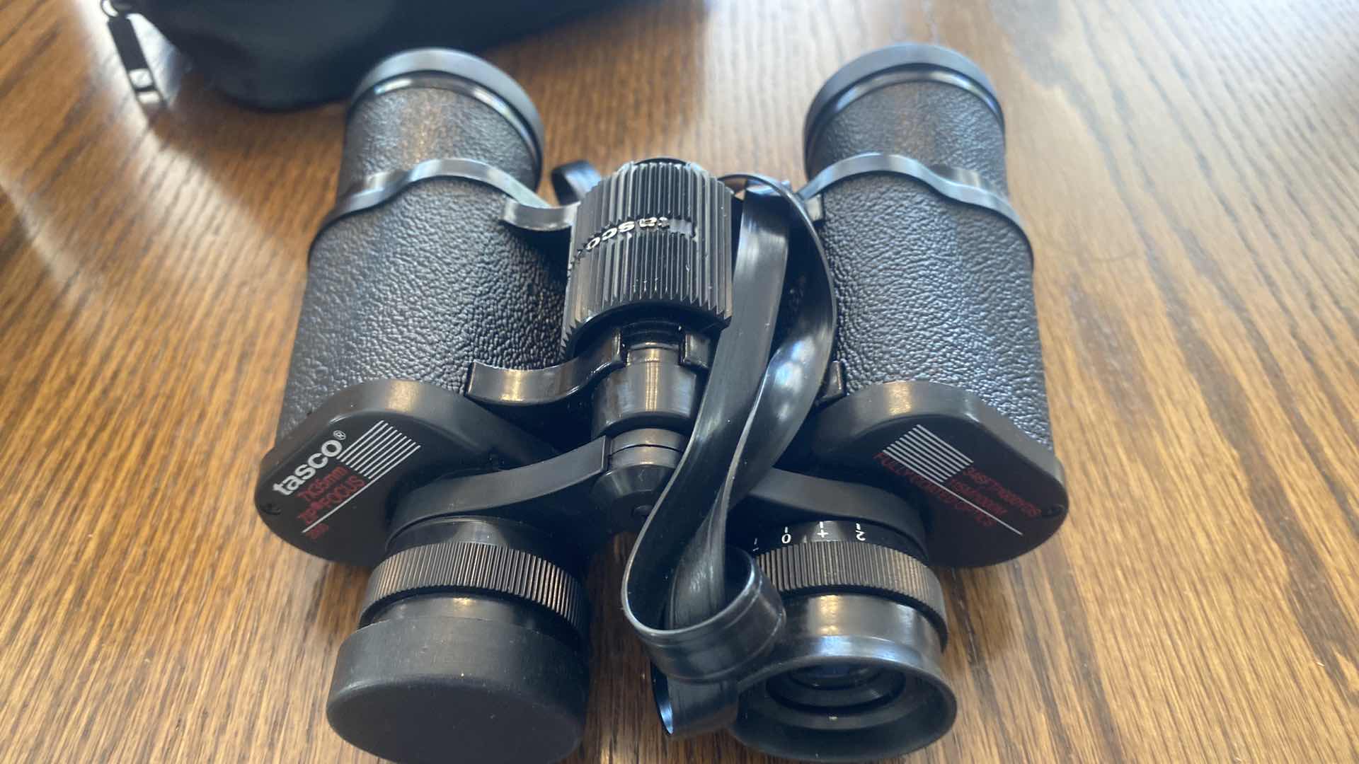 Photo 1 of TASCO BINOCULARS WITH BAG