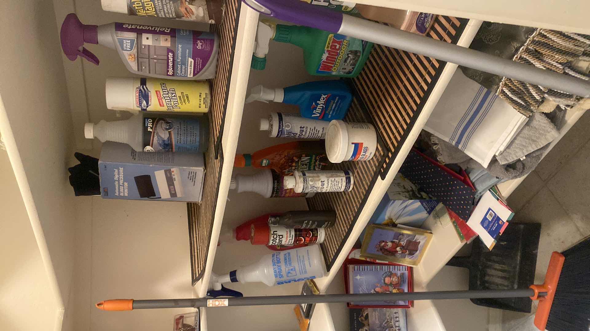 Photo 1 of CONTENTS OF CLOSET - PAPER GOODS, CLEANING SUPPLIES & LINENS