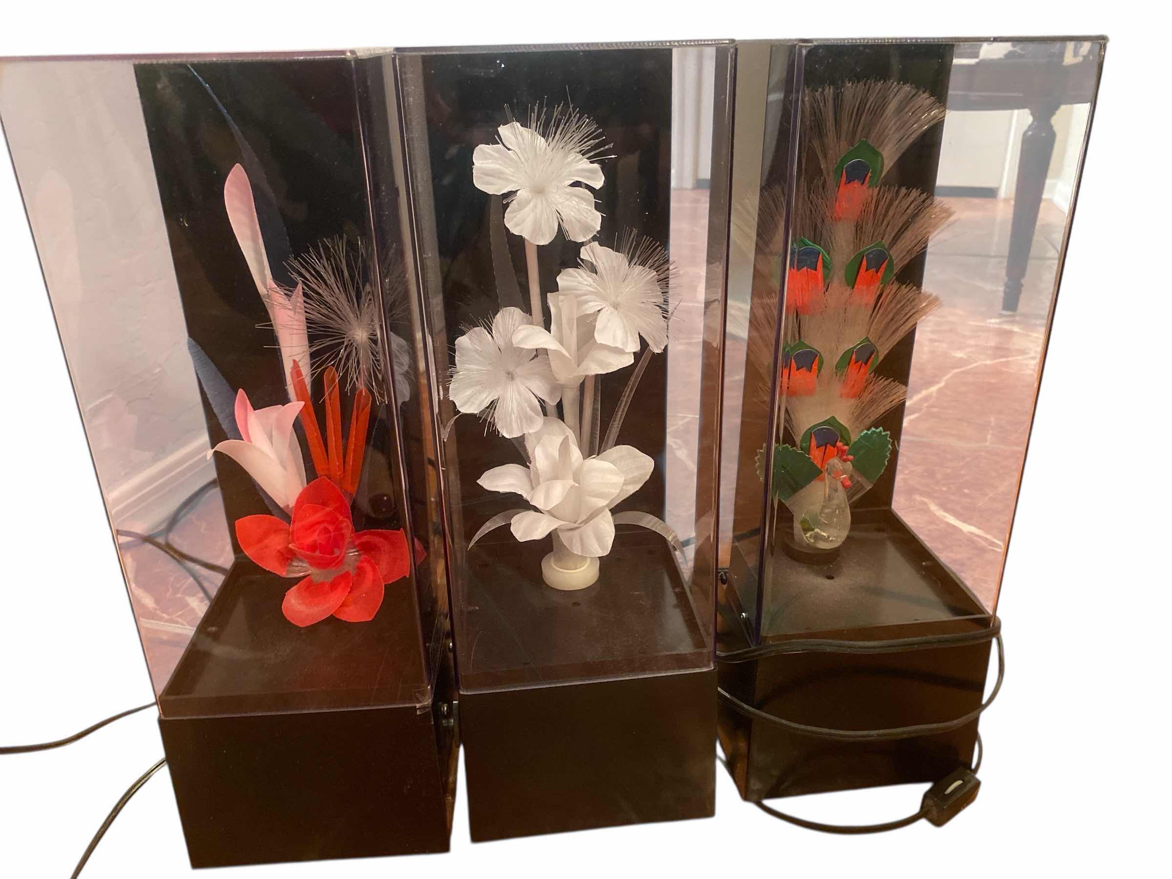 Photo 1 of 4 - VINTAGE FIBER OPTIC LAMPS W/ MUSIC - 2 FLORAL 1 PEACOCK H14” (both florals need bulbs, top of peacock has cracks)