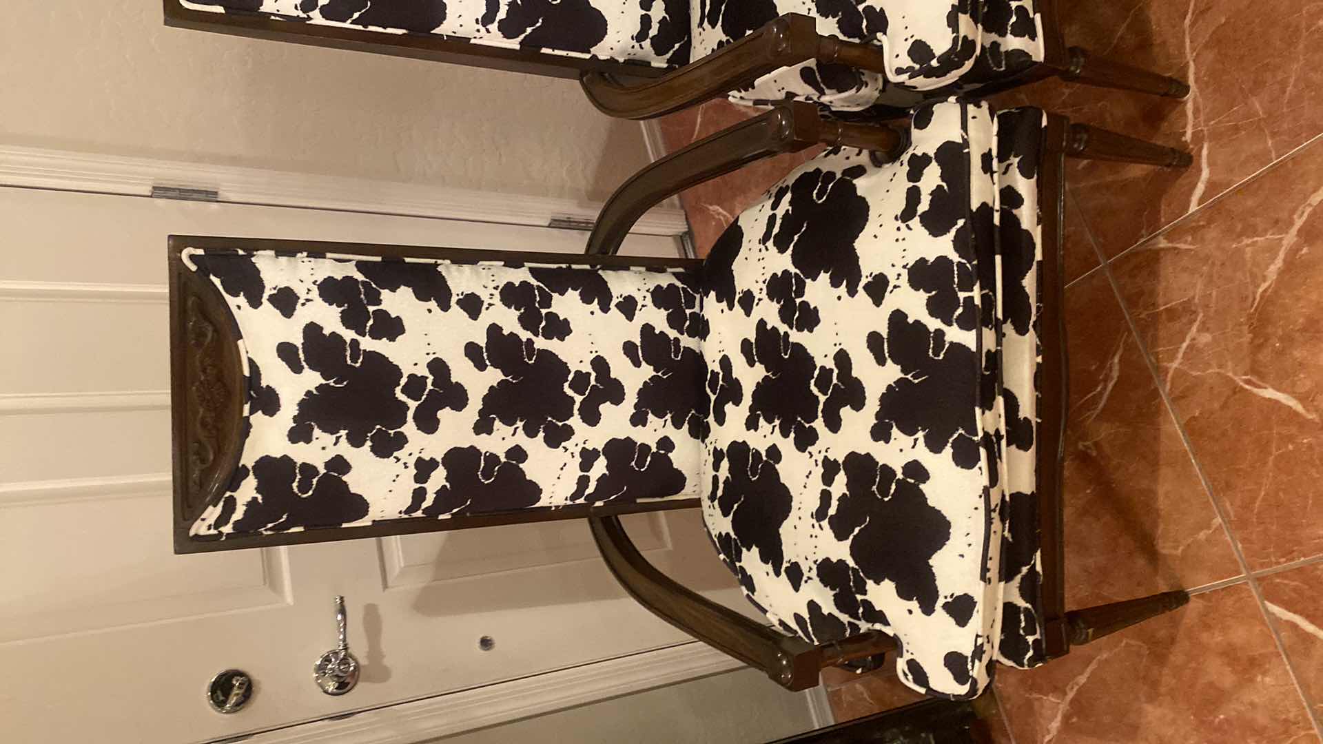 Photo 1 of PAIR OF WOOD ARM CHAIRS WITH BLACK & IVORY COW PRINT FABRIC