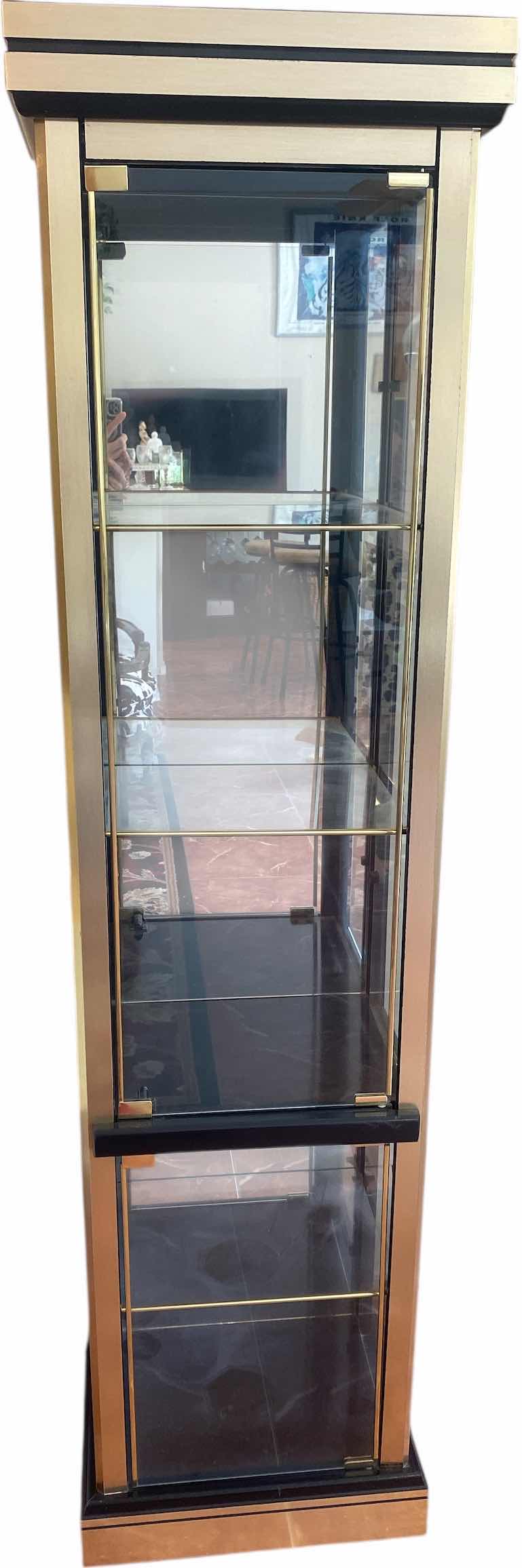 Photo 1 of GOLD & BLACK LIGHTED 2 DOOR DISPLAY CABINET W 3 ADJUSTABLE GLASS SHELVES 18 1/2” x 14” H 72” (two available each sold separately)