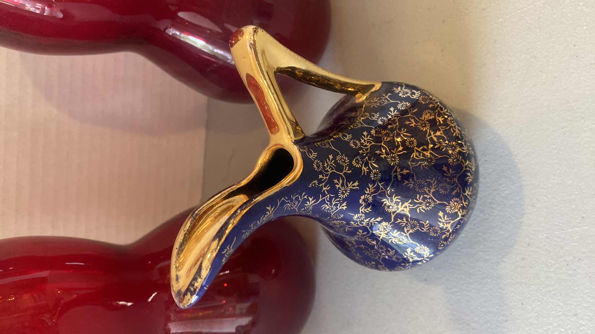 Photo 1 of VINTAGE COBALT BLUE & 22K PITCHER H6” & 2 RED GLASD VASES H9”