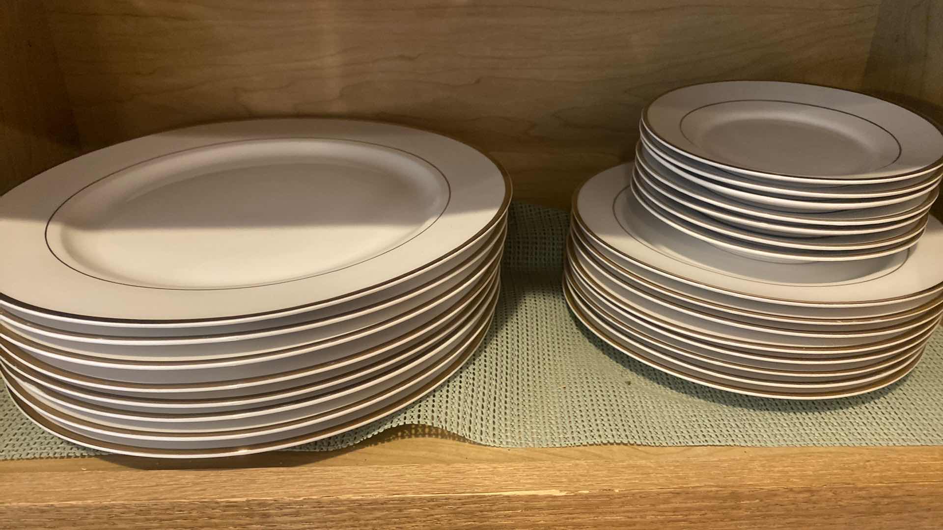 Photo 1 of CONTENTS OF CABINET - 47 PCS GOLDEN TRADITIONS PORCELAIN DINNERWARE & GLASSES