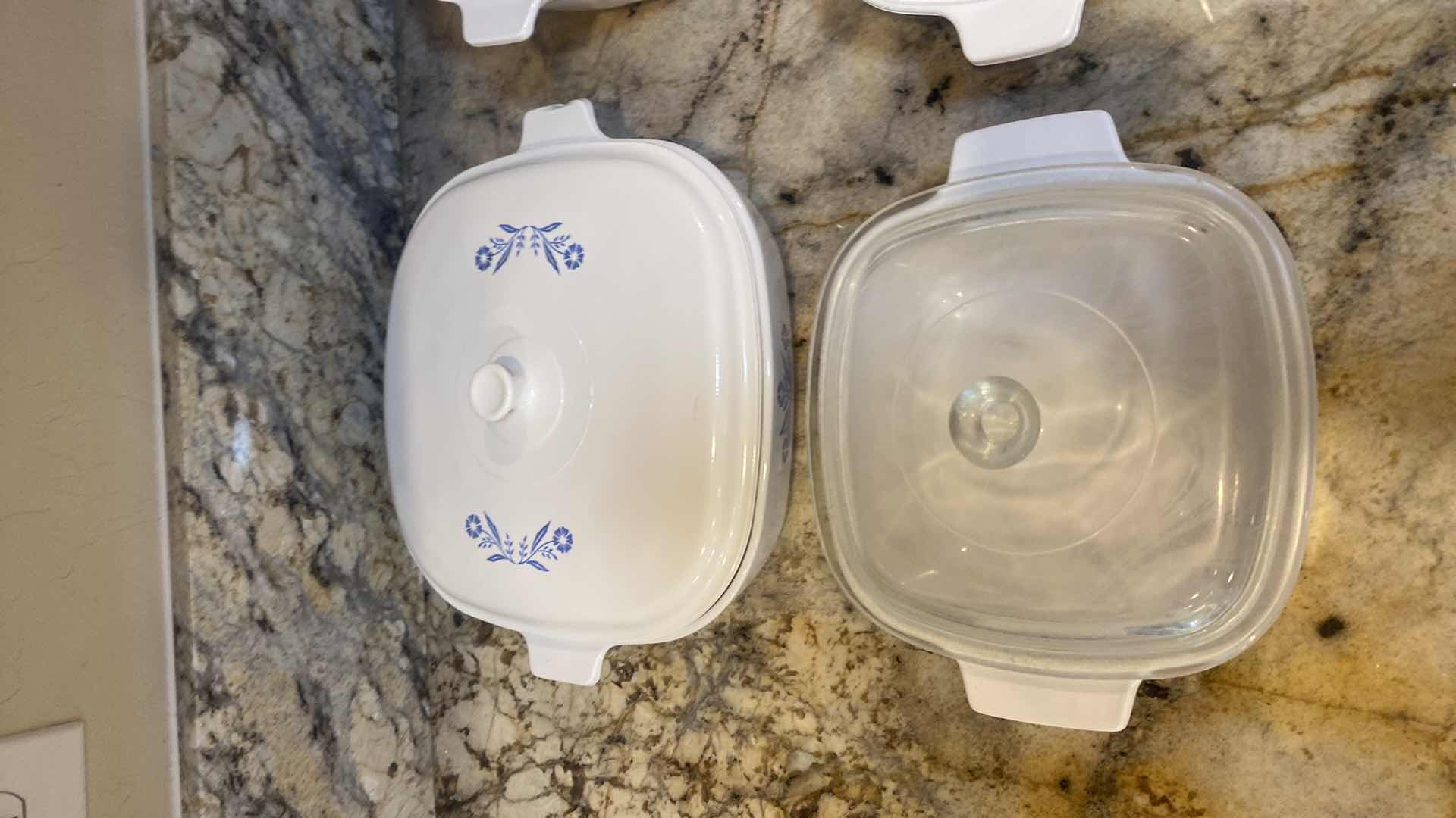 Photo 1 of CORNINGWARE 6 PIECE SET (handle is chipped on back left covered casserole)