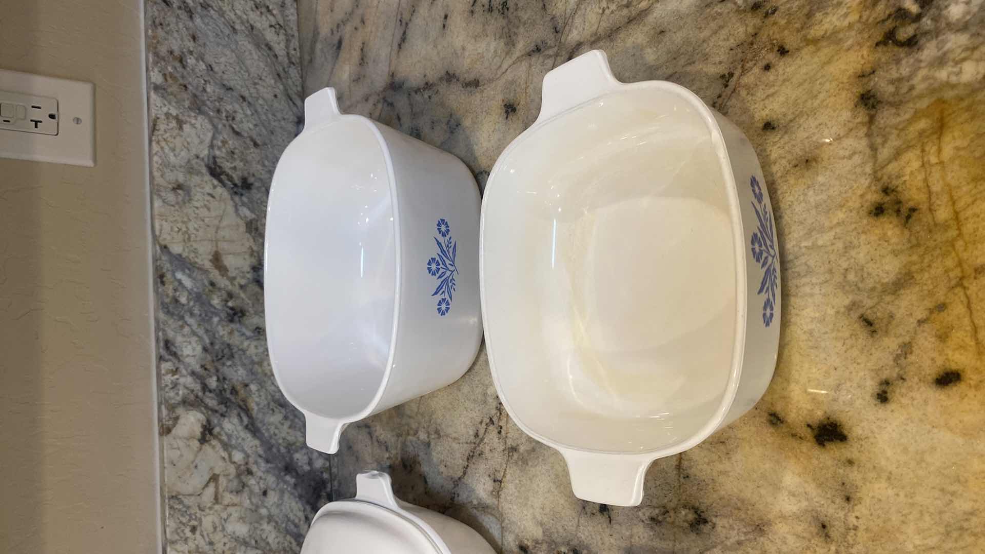 Photo 1 of CORNINGWARE 6 PIECE SET (handle is chipped on back left covered casserole)