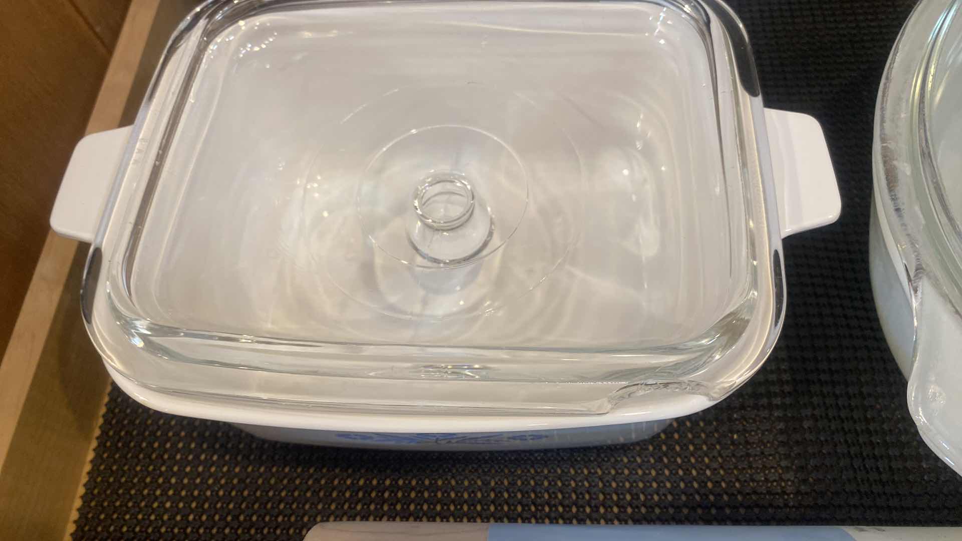 Photo 1 of CONTENTS OF CABINET - ONE SHELF CORNINGWARE & ANCHOR HOCKING