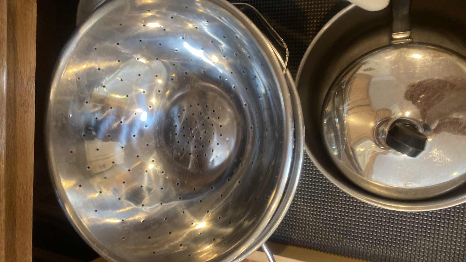 Photo 1 of CONTENTS OF CABINET - POTS   PANS & COLLANDERS
