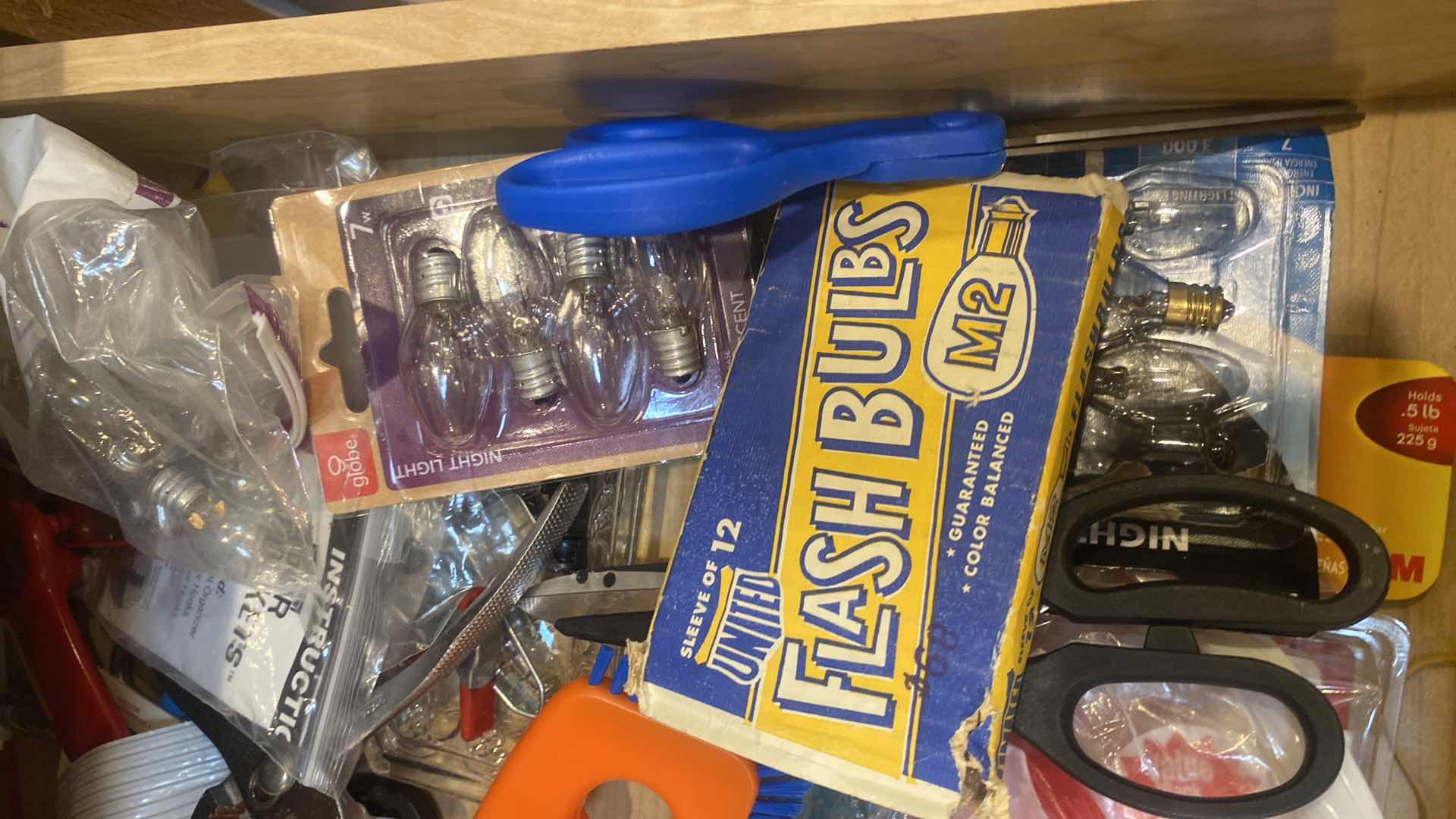 Photo 1 of CONTENTS OF CABINET - JAR OPENERS FIL BULBS & MORE