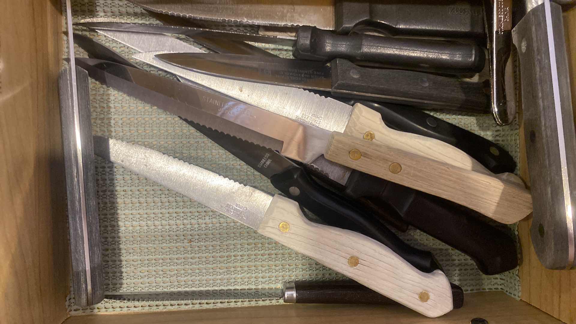 Photo 1 of CONTENTS OF CABINET - KNIVES TONGS & SERVE