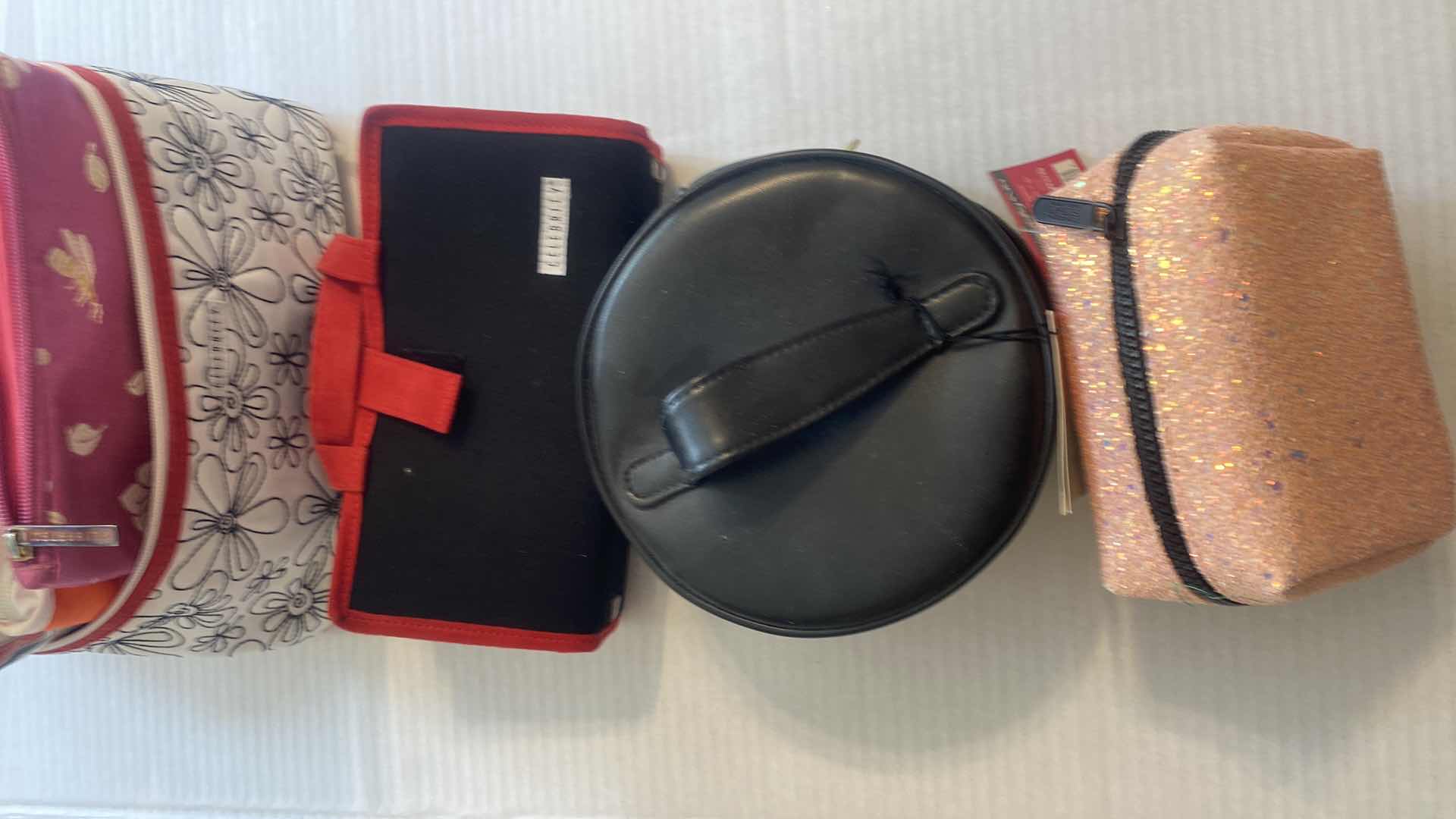 Photo 1 of COSMETIC BAG ASSORTMENT