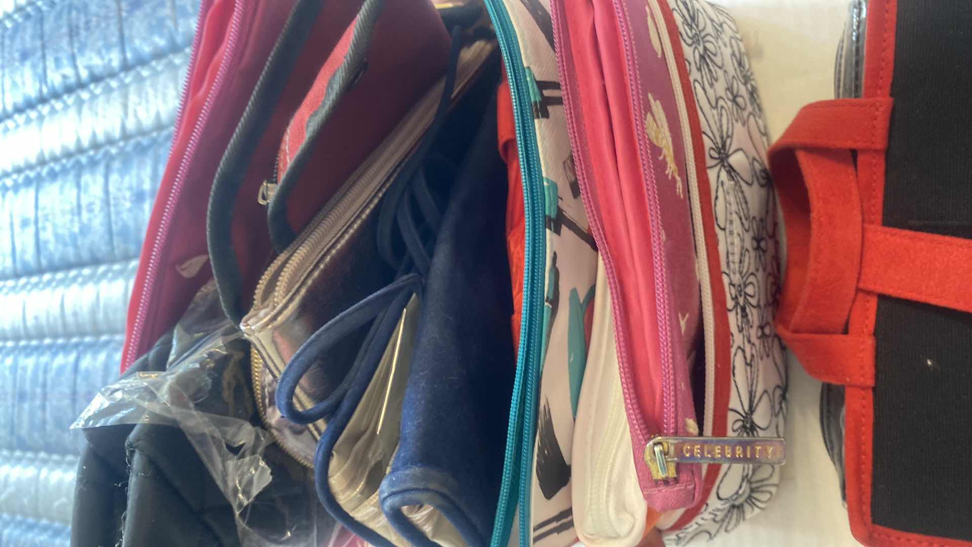 Photo 1 of COSMETIC BAG ASSORTMENT