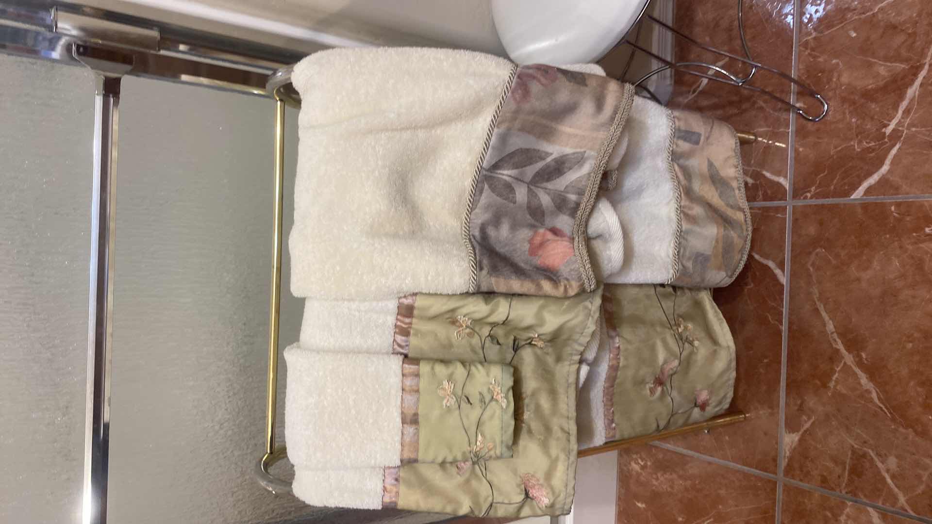 Photo 1 of LIGHT BRASS COLOR COMFORTER HOLDER & TOWELS