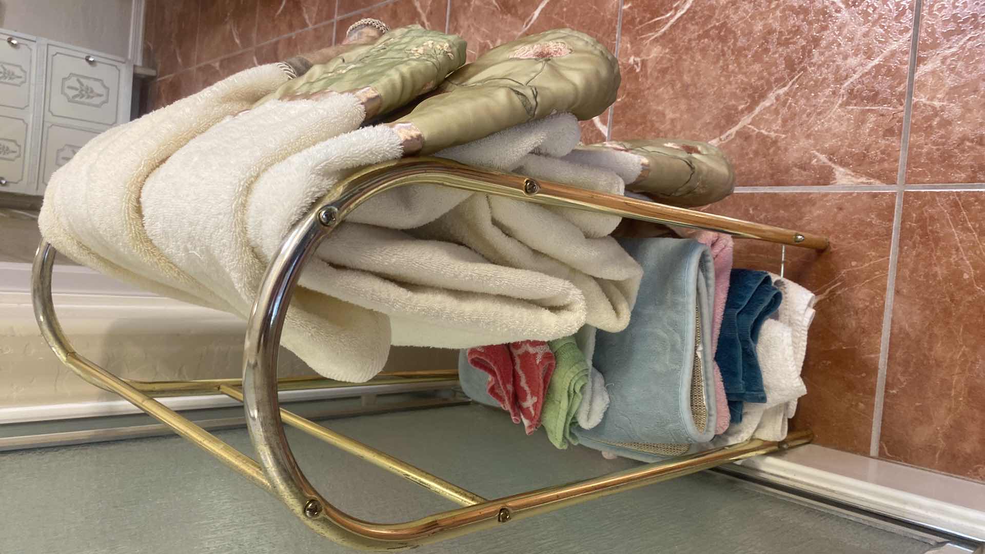 Photo 1 of LIGHT BRASS COLOR COMFORTER HOLDER & TOWELS