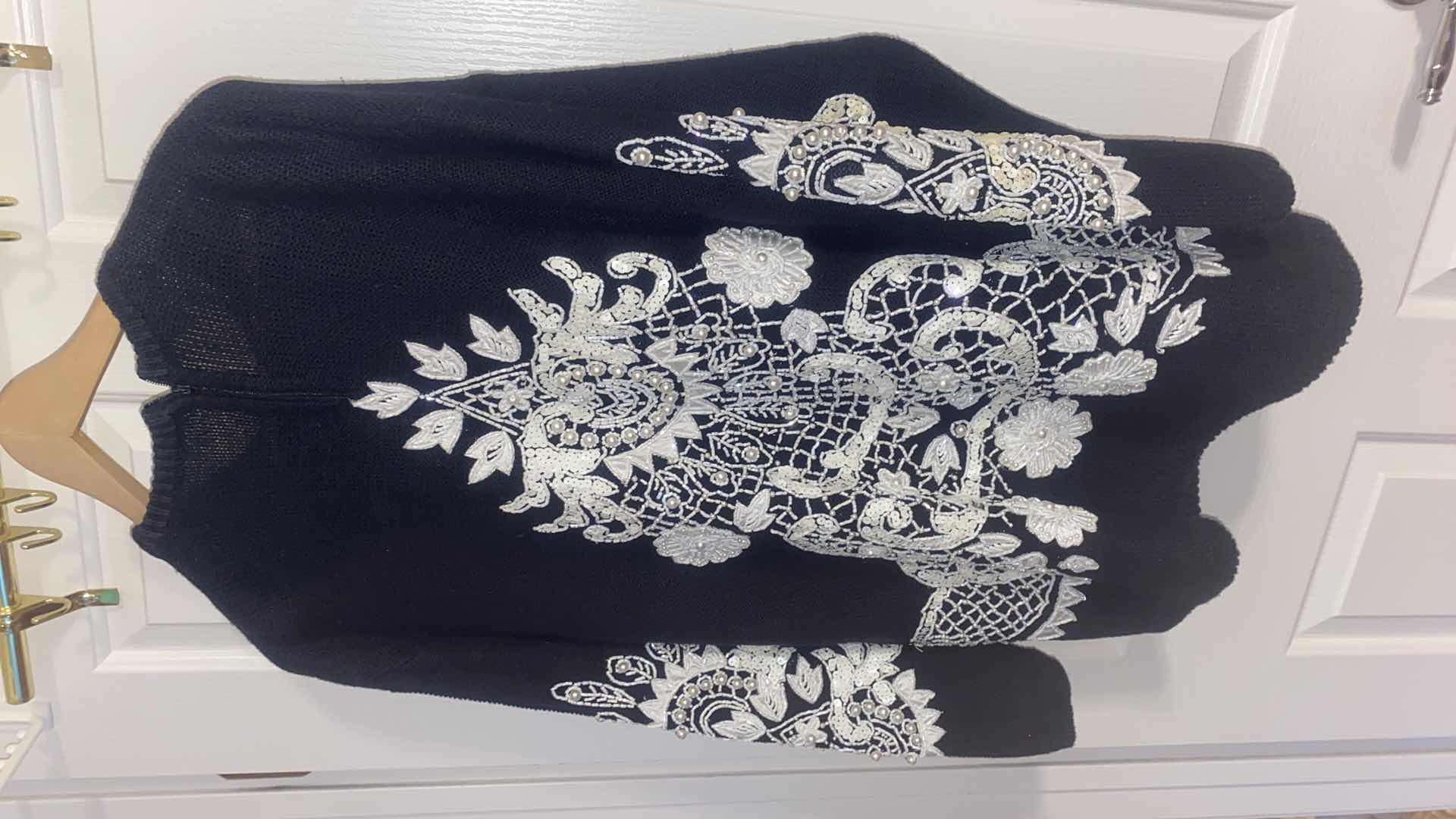 Photo 1 of WOMENS SIZE M OVERSIZED SEQUIN SWEATER