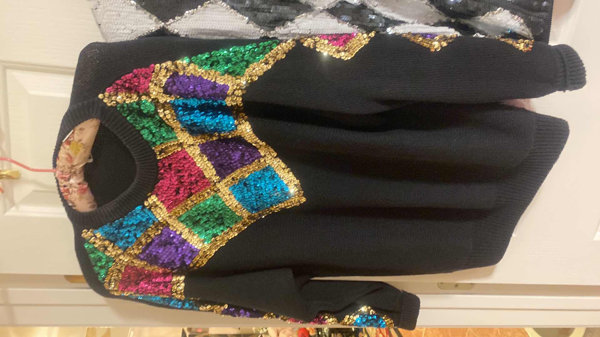 Photo 1 of WOMENS SIZE L SEQUIN JACKET & SIZE M OVERSIZED SWEATER
