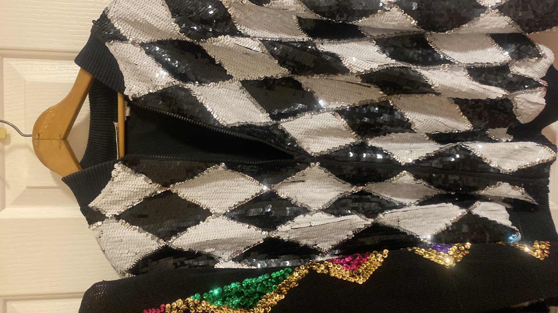 Photo 1 of WOMENS SIZE L SEQUIN JACKET & SIZE M OVERSIZED SWEATER