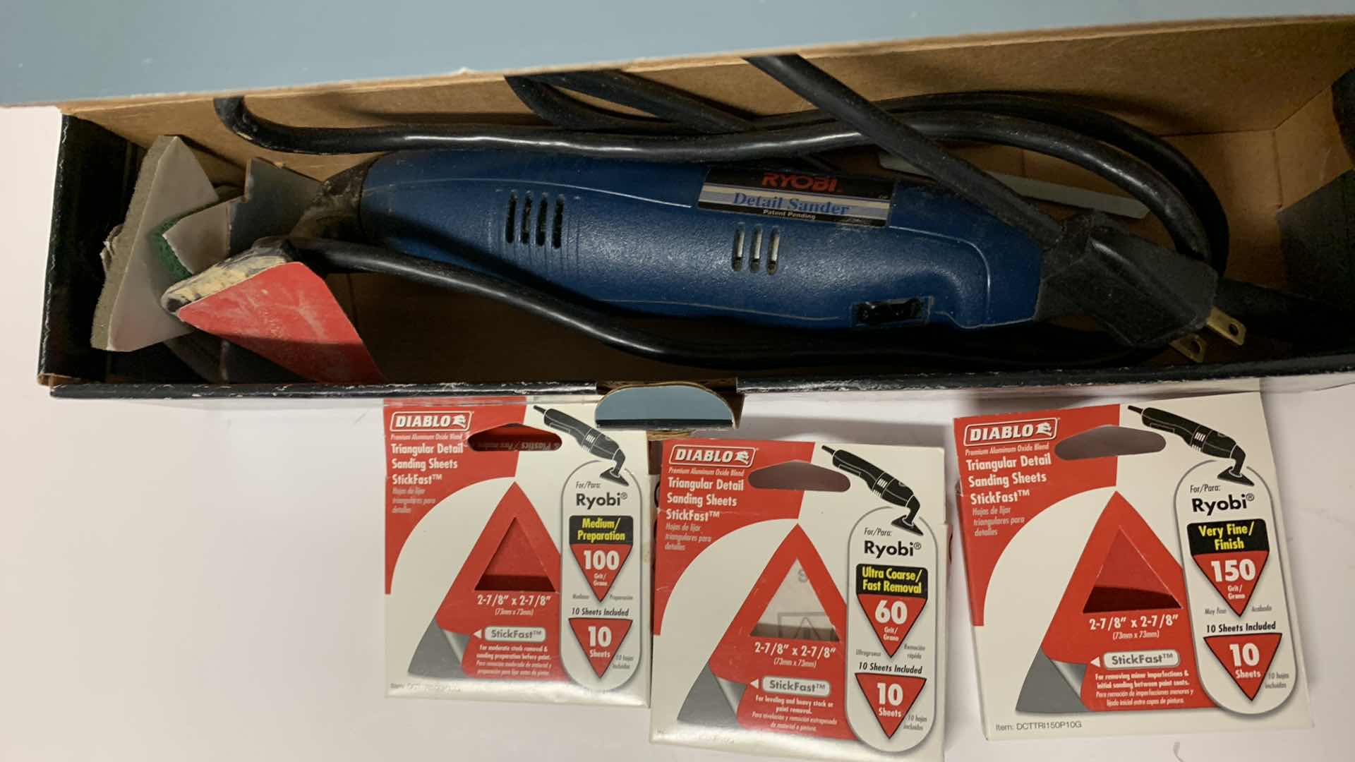 Photo 1 of RYOBI DETAIL SANDER AND SANDING SHEETS