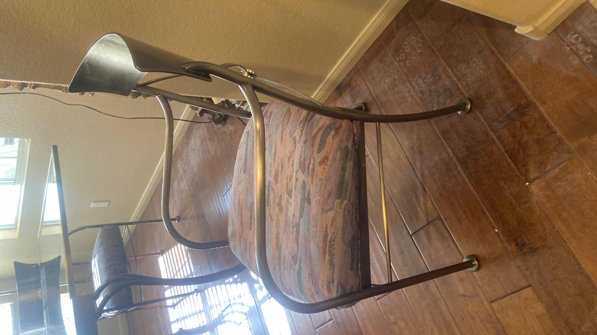 Photo 1 of 7 PIECE SMOKED GLASS AND HEAVY METAL TABLE, WITH 6 CHAIRS (2 ARM CHAIRS 4 DINING CHAIRS, TABLE EXPANDS) 5’ X 40” H30” EXPANDS TO 10’