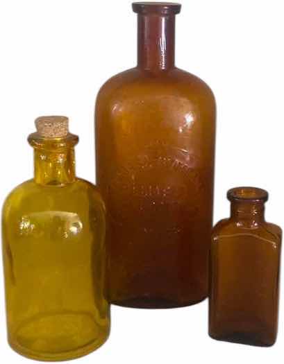 Photo 1 of THOMAS & THOMPSON AMBER GLASS 16oz DRUG STORE BOTTLE WITH 3 SMALL BOTTLED UNMARKED