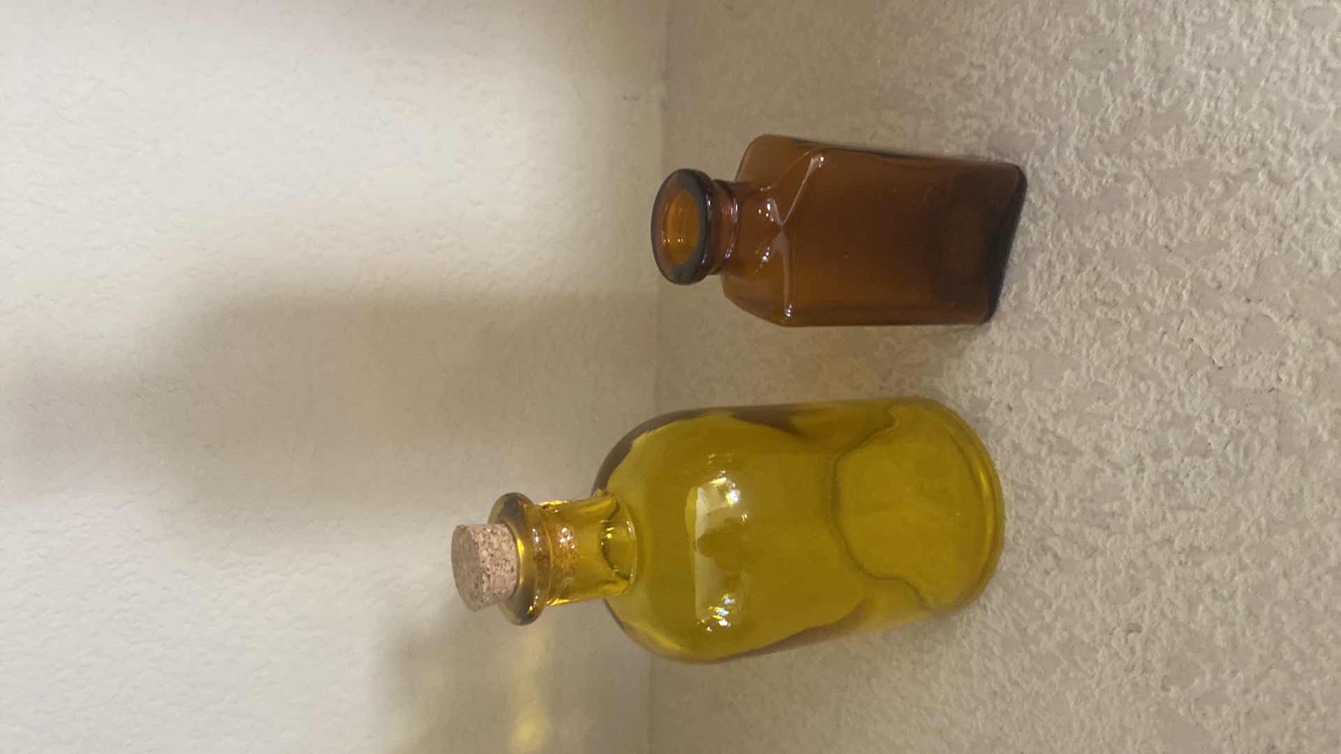 Photo 1 of THOMAS & THOMPSON AMBER GLASS 16oz DRUG STORE BOTTLE WITH 3 SMALL BOTTLED UNMARKED
